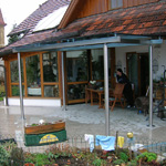 Terrassenüberdachung aus Edelstahl und Glas